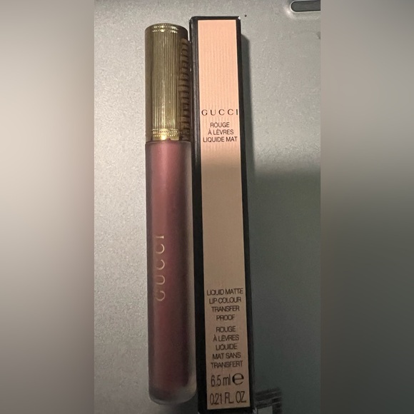 GUCCI
LIQUID MATTE-Grace Cinnamon 
LIP COLOUR
TRANSFER
PROOF
6.5 ml 
0.21 FL. OZ - Picture 1 of 4